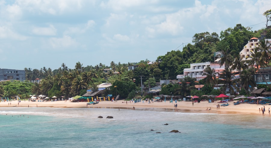 Mirissa Beach with palm trees, Sri Lanka — photo by Zoshua Colah on Unsplash